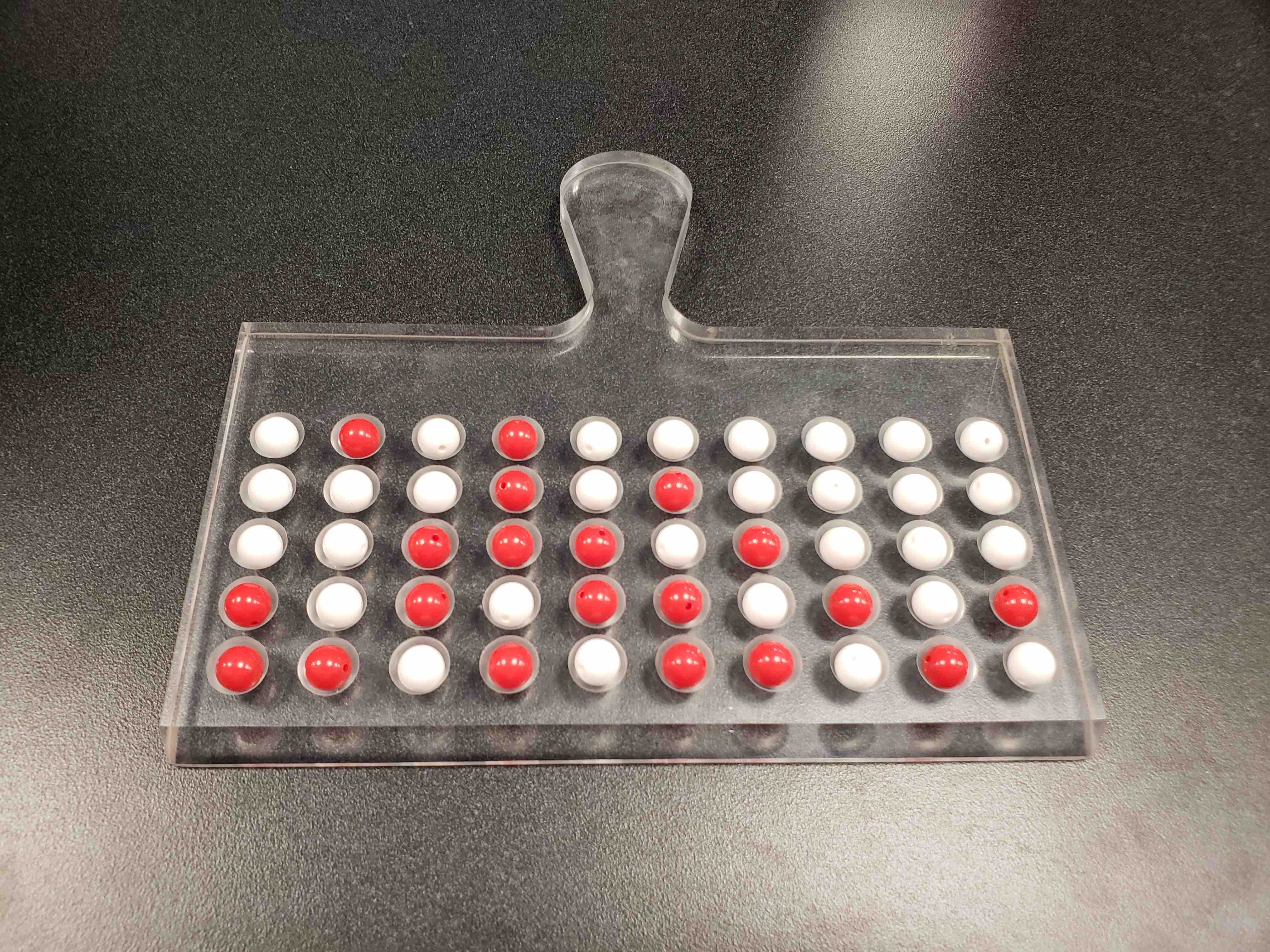 Tactile shovel for sampling n = 50 balls